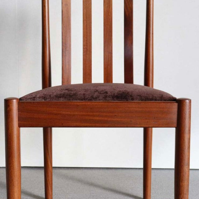 Vintage Meredew British mid-century teak dining chair with vertical slat back and brown upholstered seat.