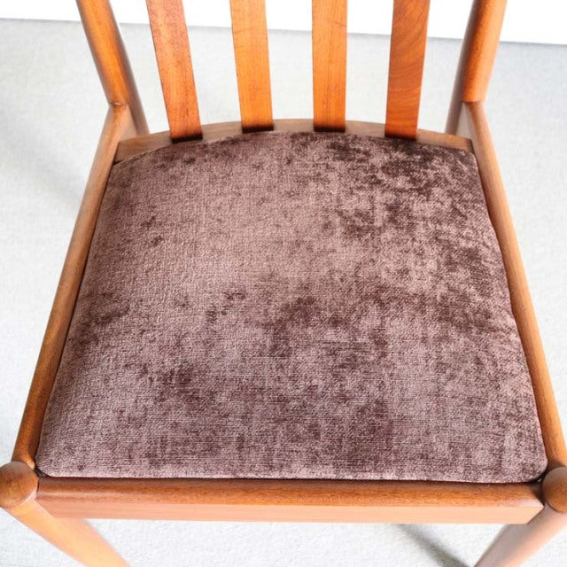 Vintage Meredew teak dining chair seat with textured brown fabric cushion and mid-century British design.