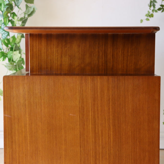 Mid-century British G-Plan teak sideboard with clean lines, rich wood grain, and sturdy legs.