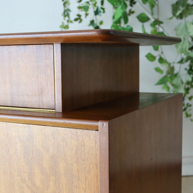 Mid-century British G-Plan teak sideboard with rich wood grain, clean lines, and sturdy legs, vintage Denmark style.