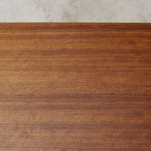 Vintage G-Plan teak sideboard top showcasing rich wood grain from British mid-century Denmark design.