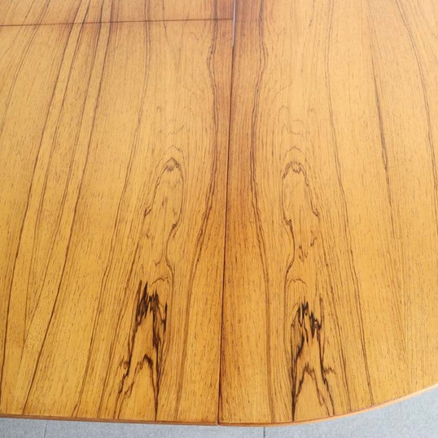 Vintage McIntosh round teak dining table top with rich grain and warm mid-century British craftsmanship from Denmark.