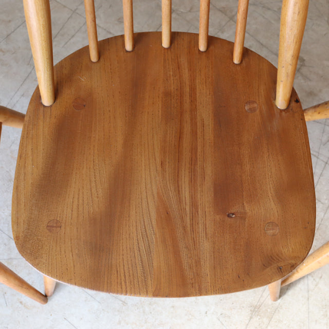 Vintage teak Arcol Goldsmith high-back chair seat showcasing rich wood grain and smooth finish.