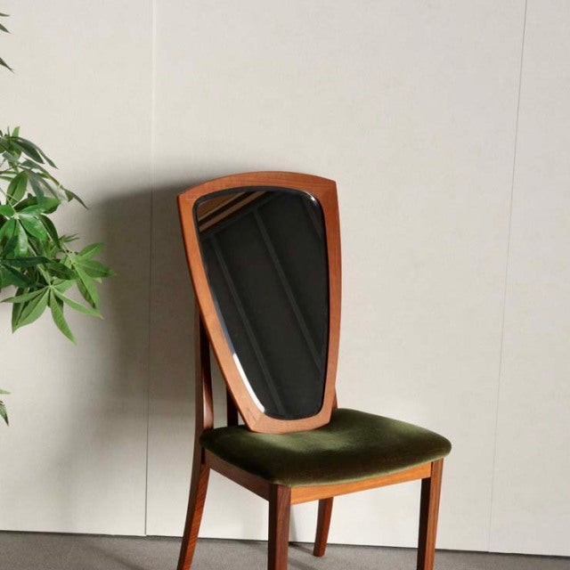 Mid-century vintage teak chair with curved backrest and olive green velvet seat, Danish design.