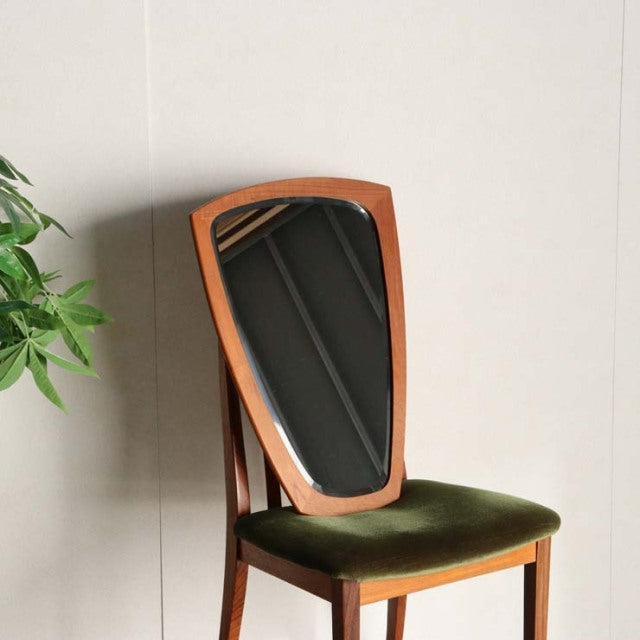 Mid-century vintage teak chair with triangular backrest mirror, olive green velvet seat, Danish-British design.