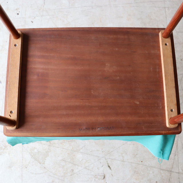 Mid-century vintage teak nest table from Denmark with British design, showcasing clean lines and slender legs.