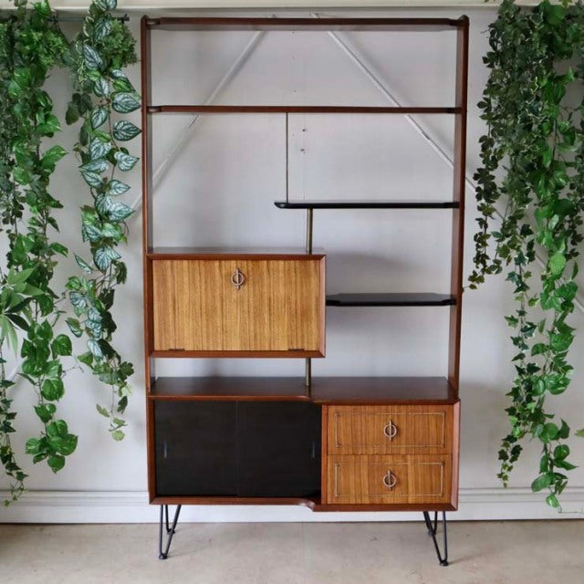 Vintage teak mid-century room divider with British-Denmark design, featuring iron hairpin legs, open shelves, and two.