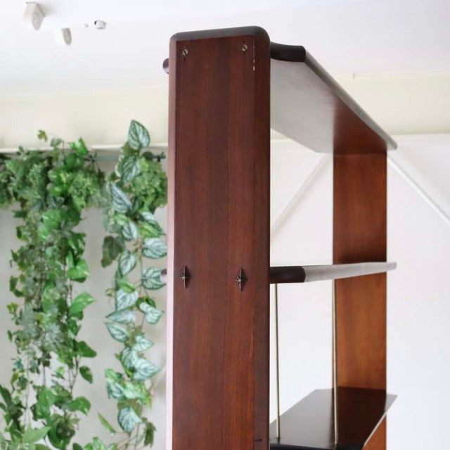 Vintage teak mid-century room divider with British-Denmark design, iron legs, and smooth wood grain finish.