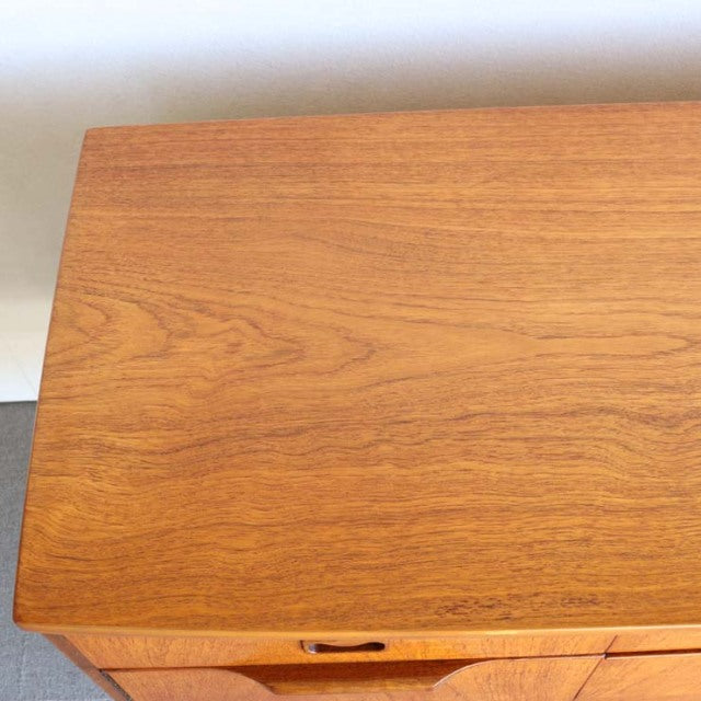 Top surface of vintage teak sideboard showing smooth wood grain and rich mid-century finish from British-Denmark design.