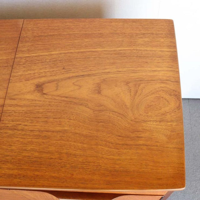 Top view of mid-century British vintage teak sideboard showing rich wood grain and smooth finish.
