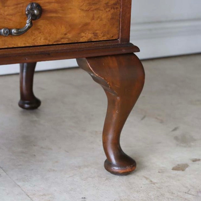 Mid-century British vintage teak record cabinet leg with rich wood grain and elegant cabriole design.