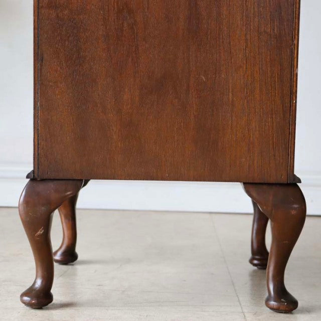 Vintage British walnut record cabinet with carved cabriole legs, rich wood grain, mid-century style.