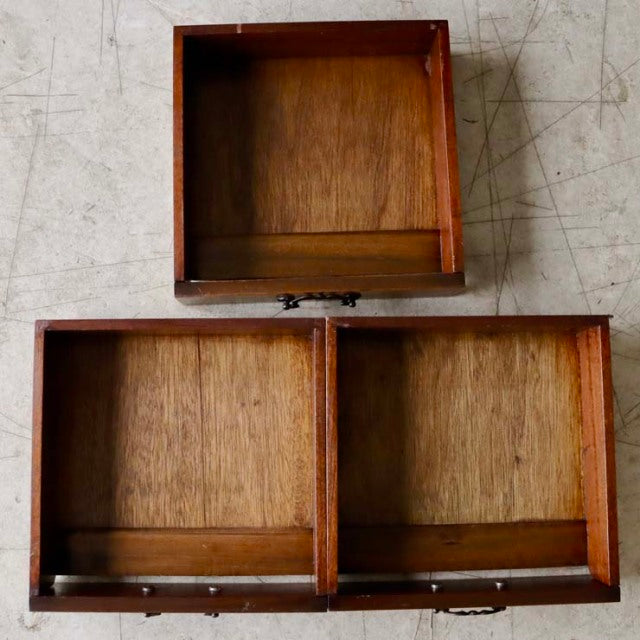 Vintage British teak record cabinet drawers with mid-century wood grain and metal hinges, Denmark style.