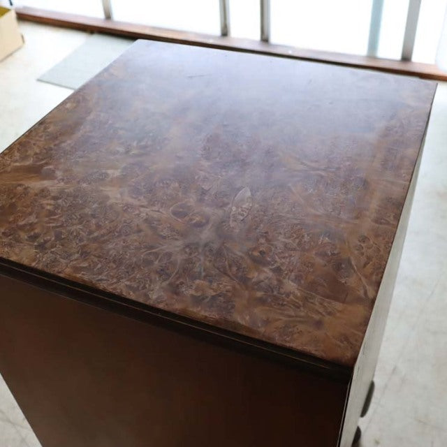 Vintage British mid-century walnut record cabinet with rich wood grain and simple rectangular top.