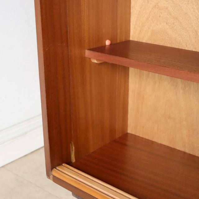 Vintage teak mid-century room divider with British design, showing detailed wood grain and iron legs.