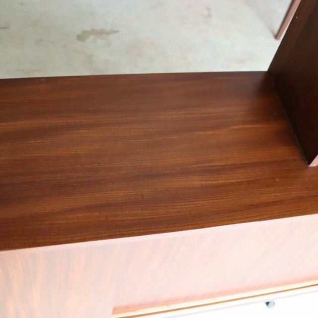 Vintage mid-century teak room divider with British and Denmark design influences, showcasing smooth wood grain and sturdy.