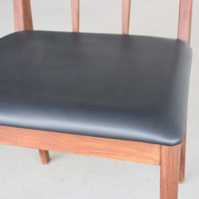 Vintage teak dining chair from Younger Fonseca series with black leather seat, mid-century British design, showcasing rich.