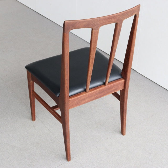 Vintage teak dining chair from the British Younger Fonseca series with black faux leather seat, mid-century Denmark design,.