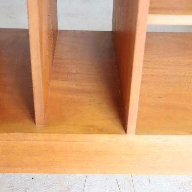 Vintage teak mid-century British TV board with vertical dividers and visible wood grain.