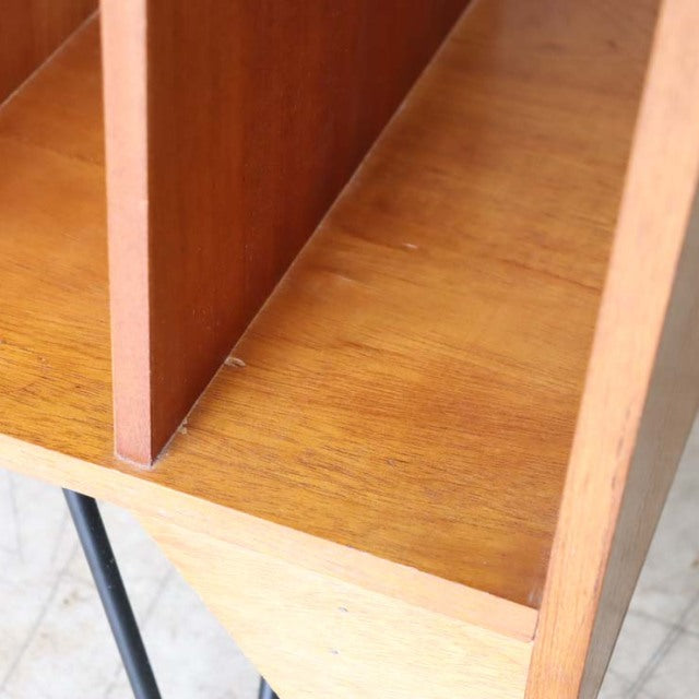 Vintage teak British mid-century TV board with smooth wood grain and slender iron legs from Denmark style.