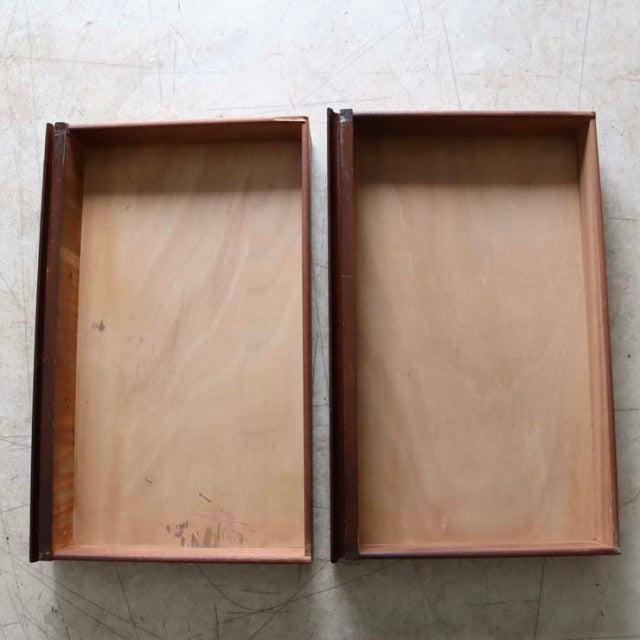 Two mid-century teak drawers with visible wood grain and smooth interiors from British vintage Elliotts of Newbury sideboard.