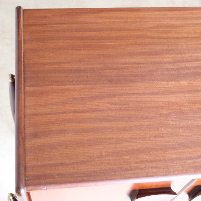 Vintage teak sideboard top with rich wood grain and smooth mid-century British craftsmanship.