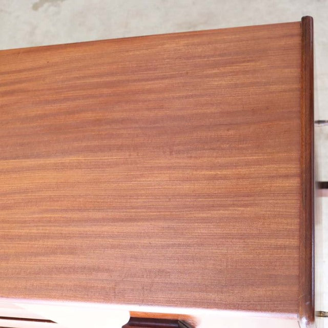 Vintage teak British mid-century sideboard top panel with rich wood grain and smooth edges.