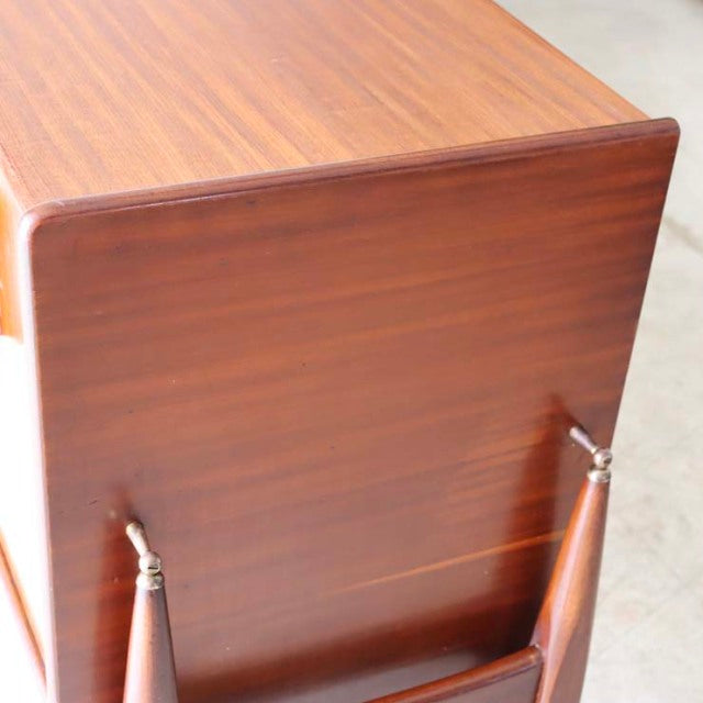 Vintage mid-century teak sideboard by Elliotts of Newbury with rich wood grain and smooth rounded edges.