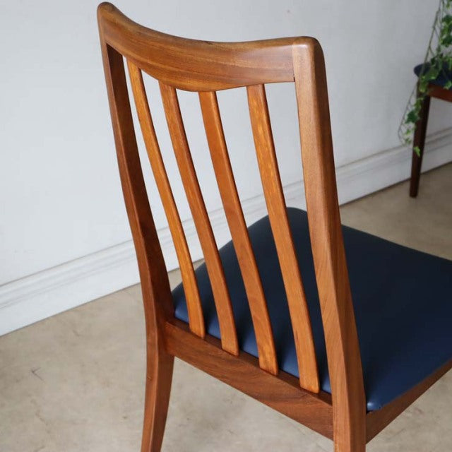 Mid-century British G-PLAN Fresco teak dining chair with dark blue upholstery and vertical slat backrest.