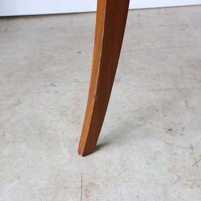 Mid-century teak dining chair leg with warm wood grain from British vintage G-PLAN Fresco series.
