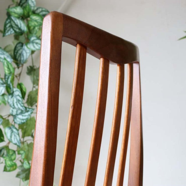 Mid-century British G-Plan dining chair in teak with curved wooden slats and ivory reupholstered seat.