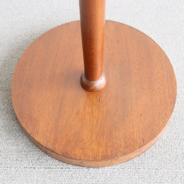 Vintage teak floor lamp base with smooth grain and mid-century British design.
