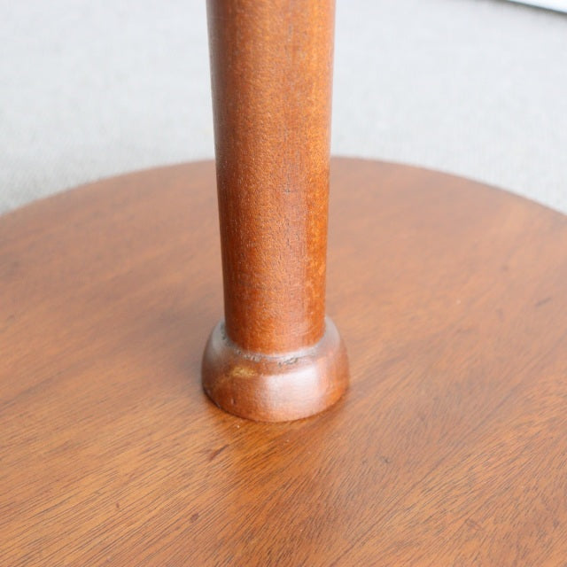 Mid-century British vintage teak floor lamp base with smooth wood grain and rounded support column.