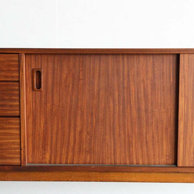 Vintage teak sideboard by British brand Nathan with distinctive mid-century wood grain and recessed handle detailing.