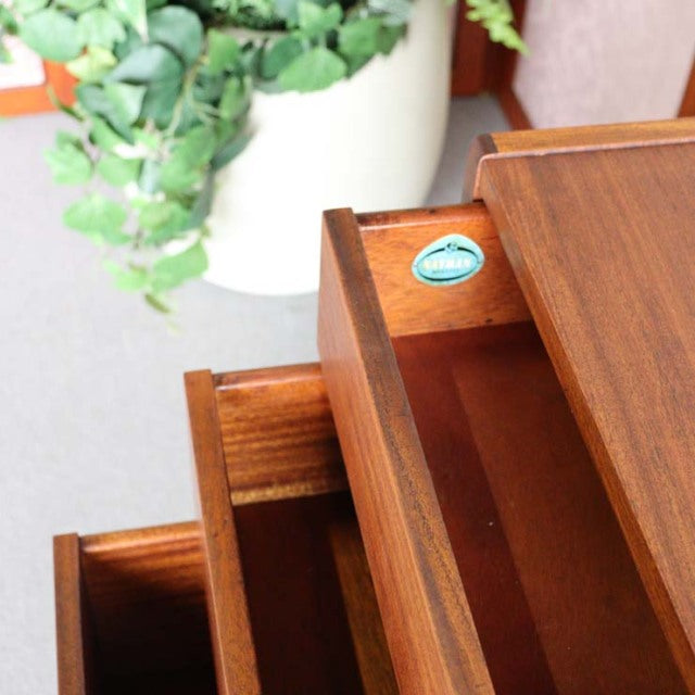 Mid-century British vintage teak sideboard by Nathan with open drawers showing rich wood grain and clean lines.