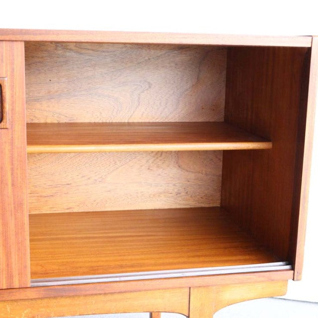 Mid-century British vintage teak sideboard by Nathan with rich wood grain and adjustable shelf.