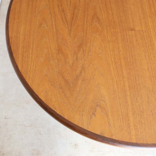 Oval vintage teak dining table top with prominent wood grain and smooth rounded edges from British mid-century G-PLAN design.