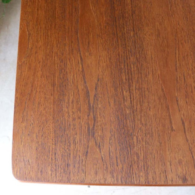 Vintage teak dining table top with rich grain texture, mid-century British design by McIntosh.