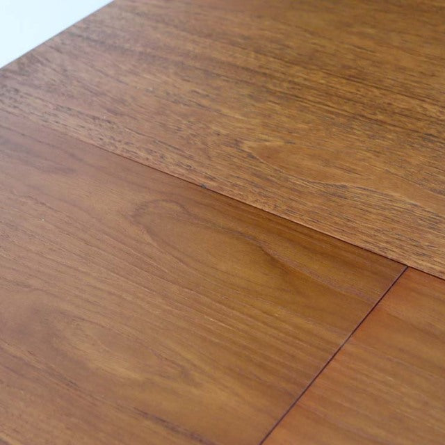Mid-century British vintage teak dining table top with rich wood grain and smooth finish.