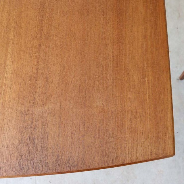 Vintage British mid-century teak dining table top with smooth wood grain and clean edges from McIntosh.