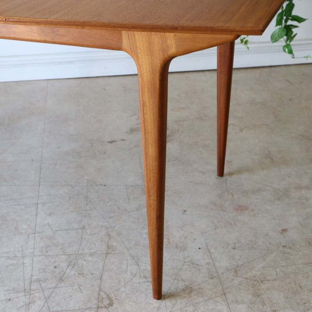 Mid-century British vintage teak dining table leg with smooth grain and tapered design from McIntosh, Denmark style.