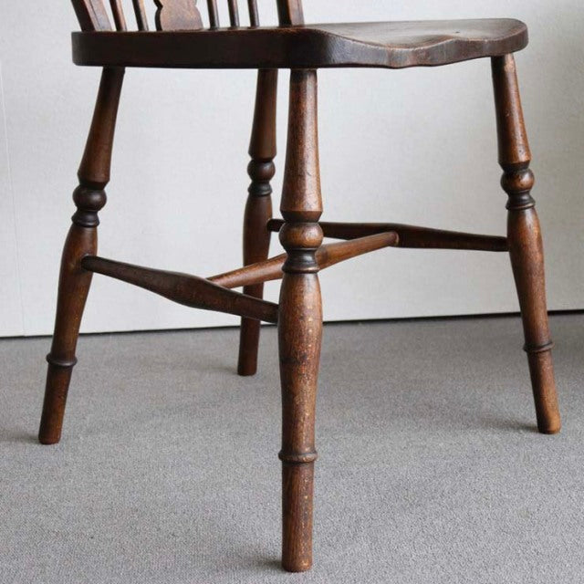 Vintage teak British mid-century kitchen chair with turned legs and contoured seat, Denmark style.