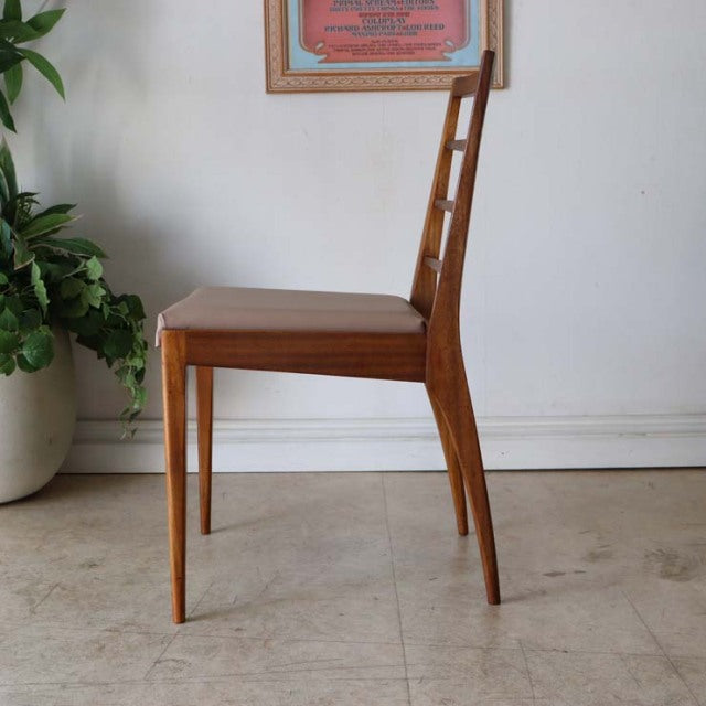 Mid-century British vintage teak dining chair by McIntosh with slim tapered legs and ladder back design.