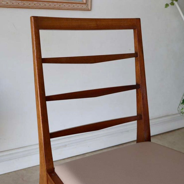 Mid-century British vintage teak dining chair with horizontal slats and beige cushioned seat.