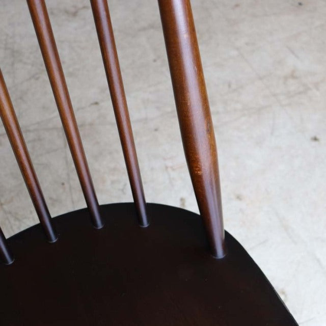 Vintage teak Ercol Goldsmith dining chair backrest with slender spindles and mid-century British craftsmanship.