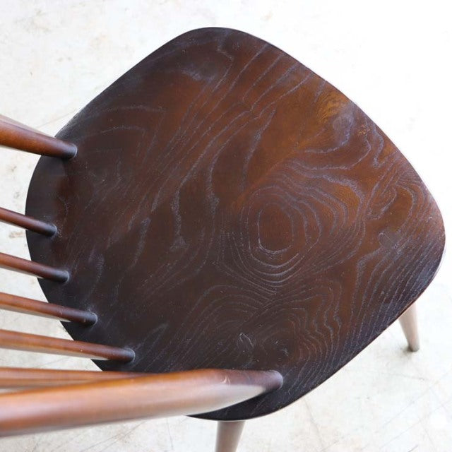 Vintage British mid-century dining chair seat in rich teak wood with visible grain and rounded edges.