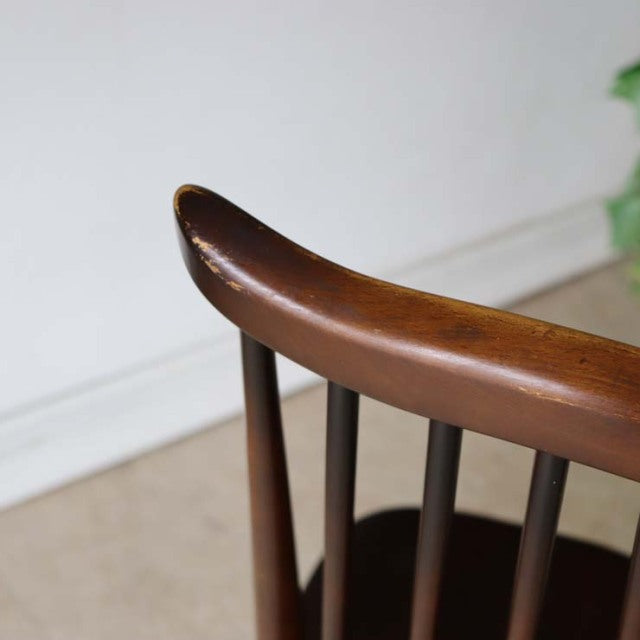 Vintage teak Arcorol Goldsmith dining chair backrest with smooth curved top rail and slender vertical spindles, mid-century.