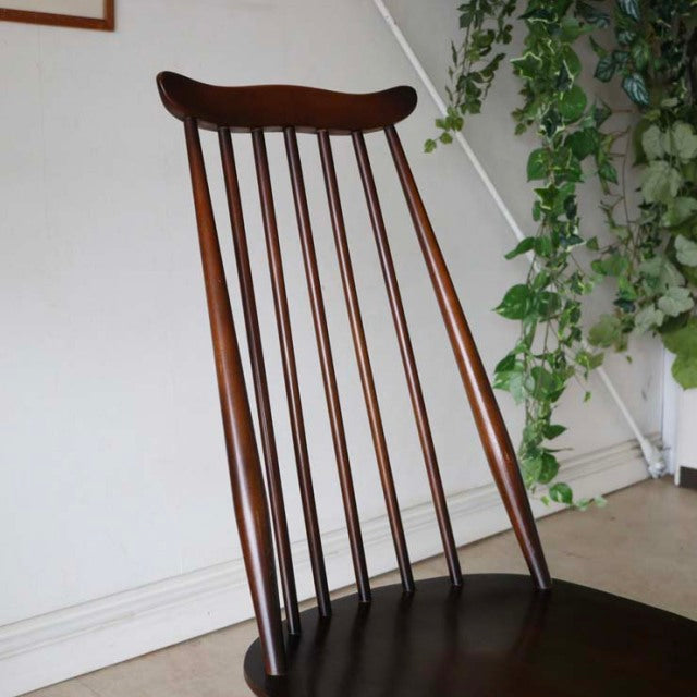 British mid-century vintage Ercol Goldsmith dining chair in polished teak with spindle back and tapered legs.