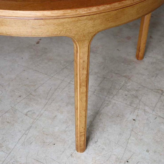 Vintage mid-century teak dining table leg with smooth rounded British design, showcasing warm wood grain and Danish.