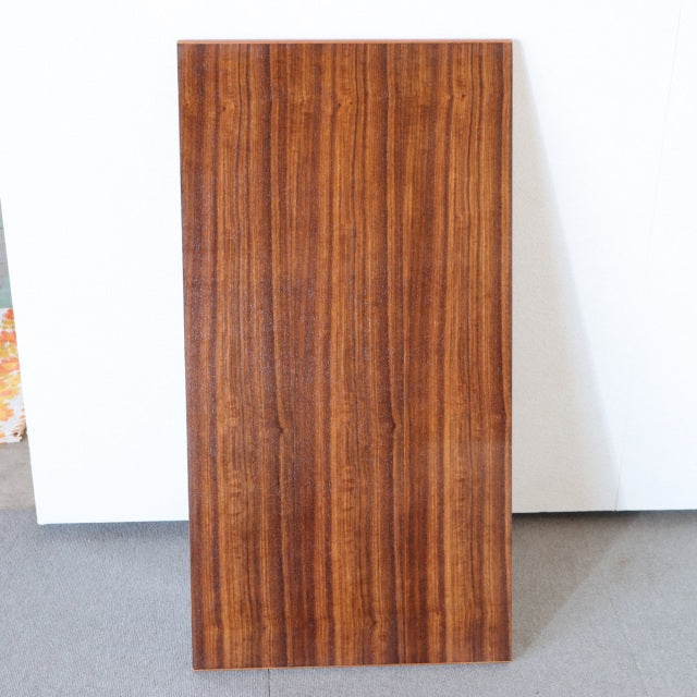 Rectangular vintage teak dining table top with rich wood grain, mid-century British design from Denmark craftsmanship.